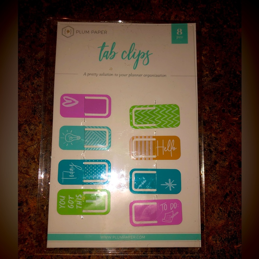 New! Plum Paper Accessories: eight (8) tab clips and four (4) fringe clips.